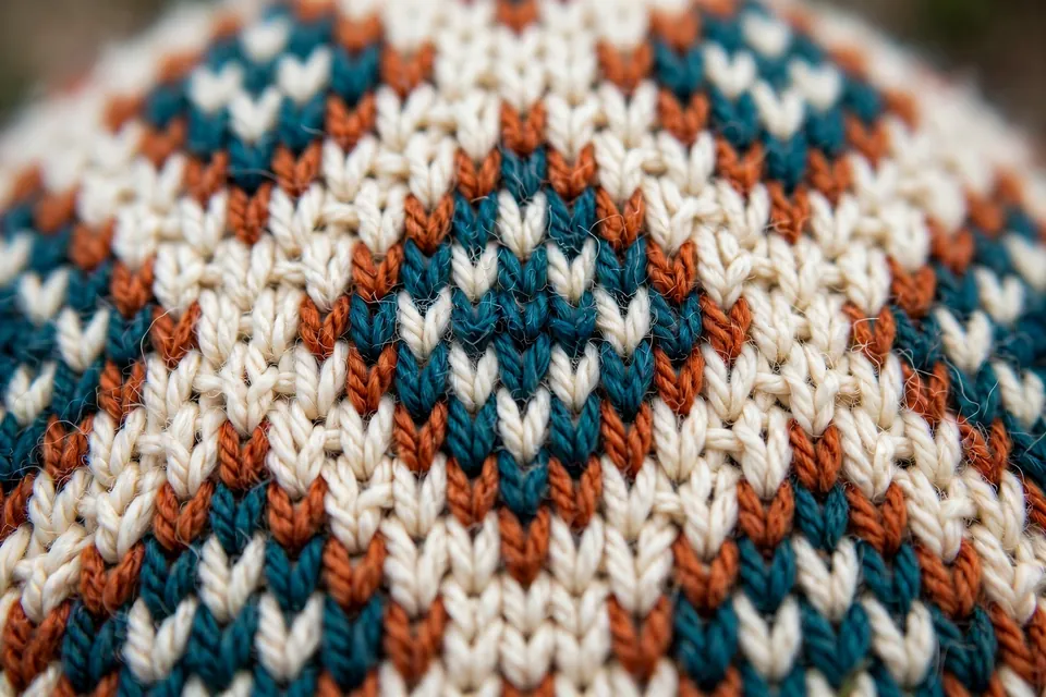 Close-up of fair isle crochet yoke colorwork in waistcoat stitch